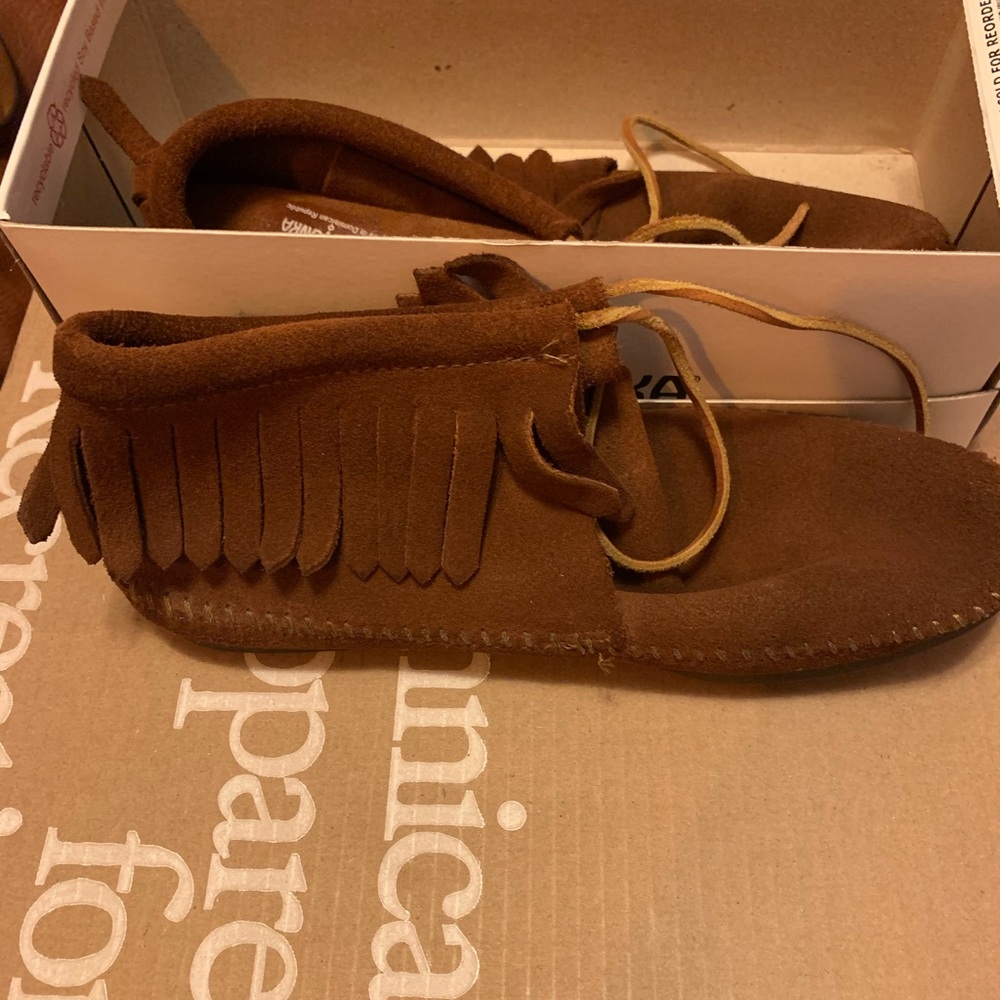Minnetonka Moccasins-classic fringe hard-sole boot